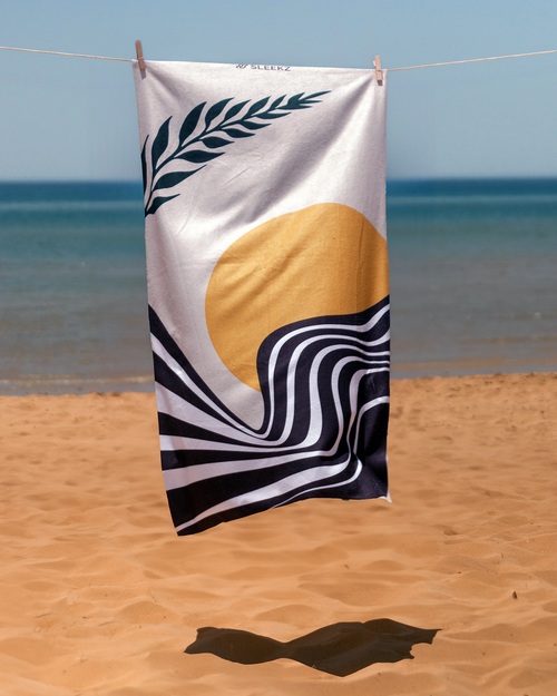 Sunrise Oasis Beach Towel